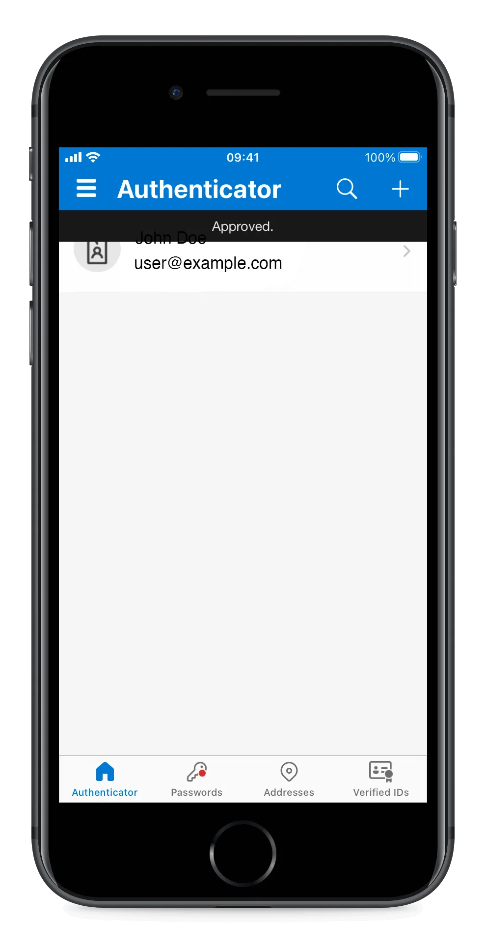 The Authenticator app showing an Approved confirmation banner